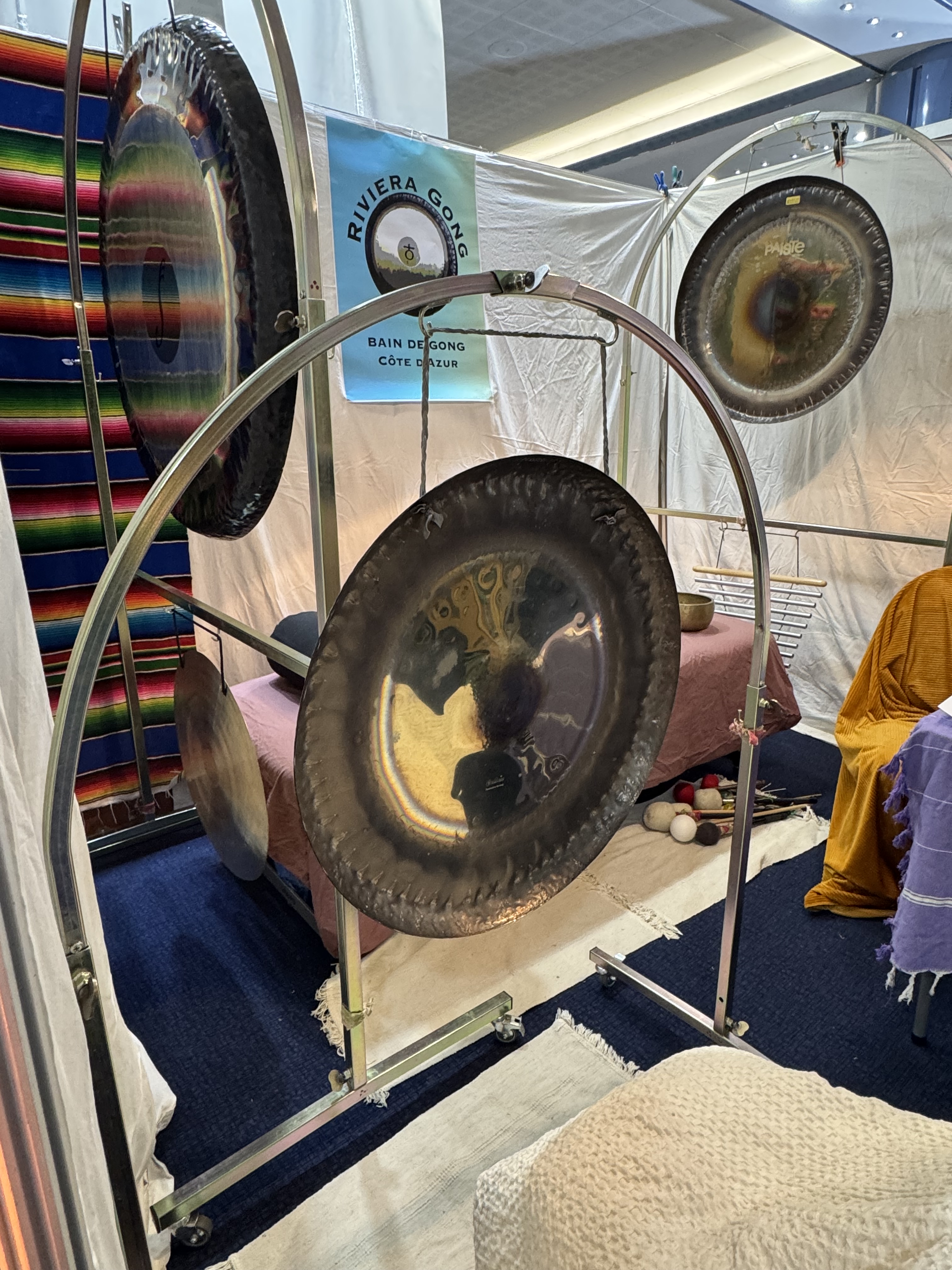 Riviera Gong at their booth in the wellness faire, Salon de Bienêtre