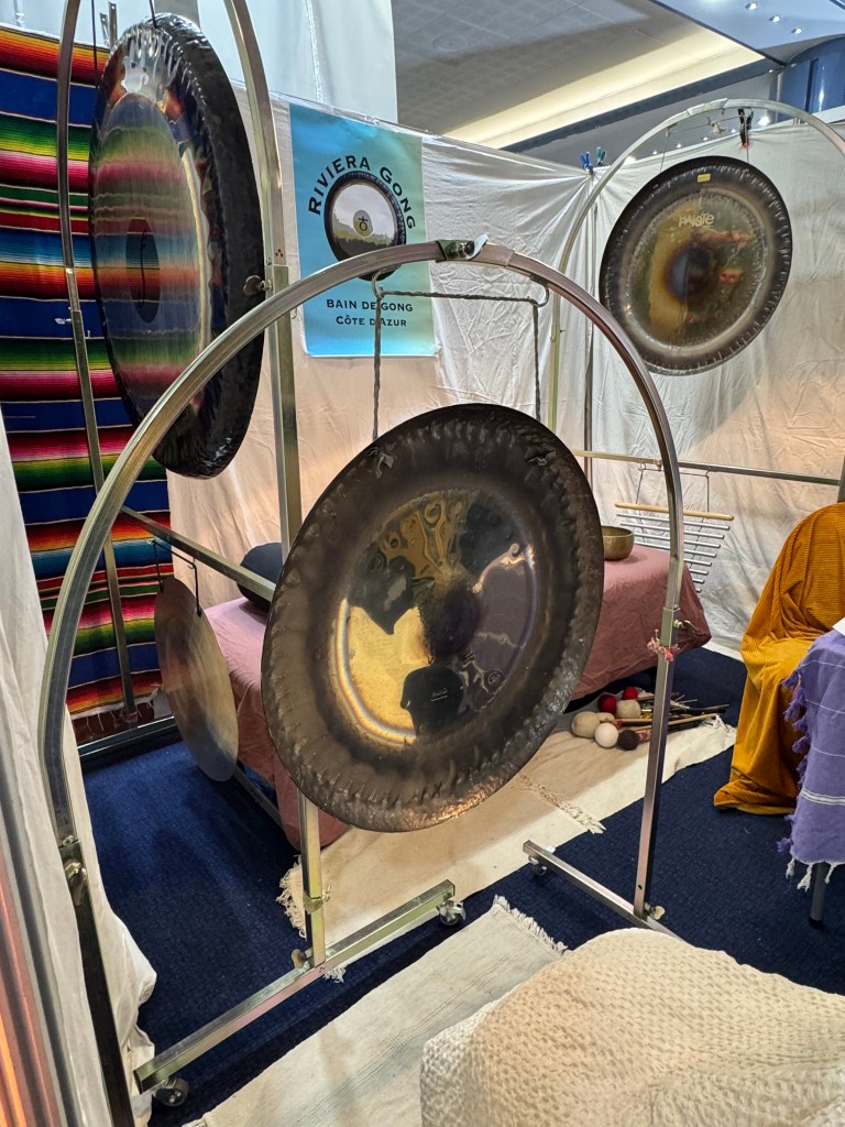 Riviera Gong at their booth in the wellness faire, Salon de Bienêtre